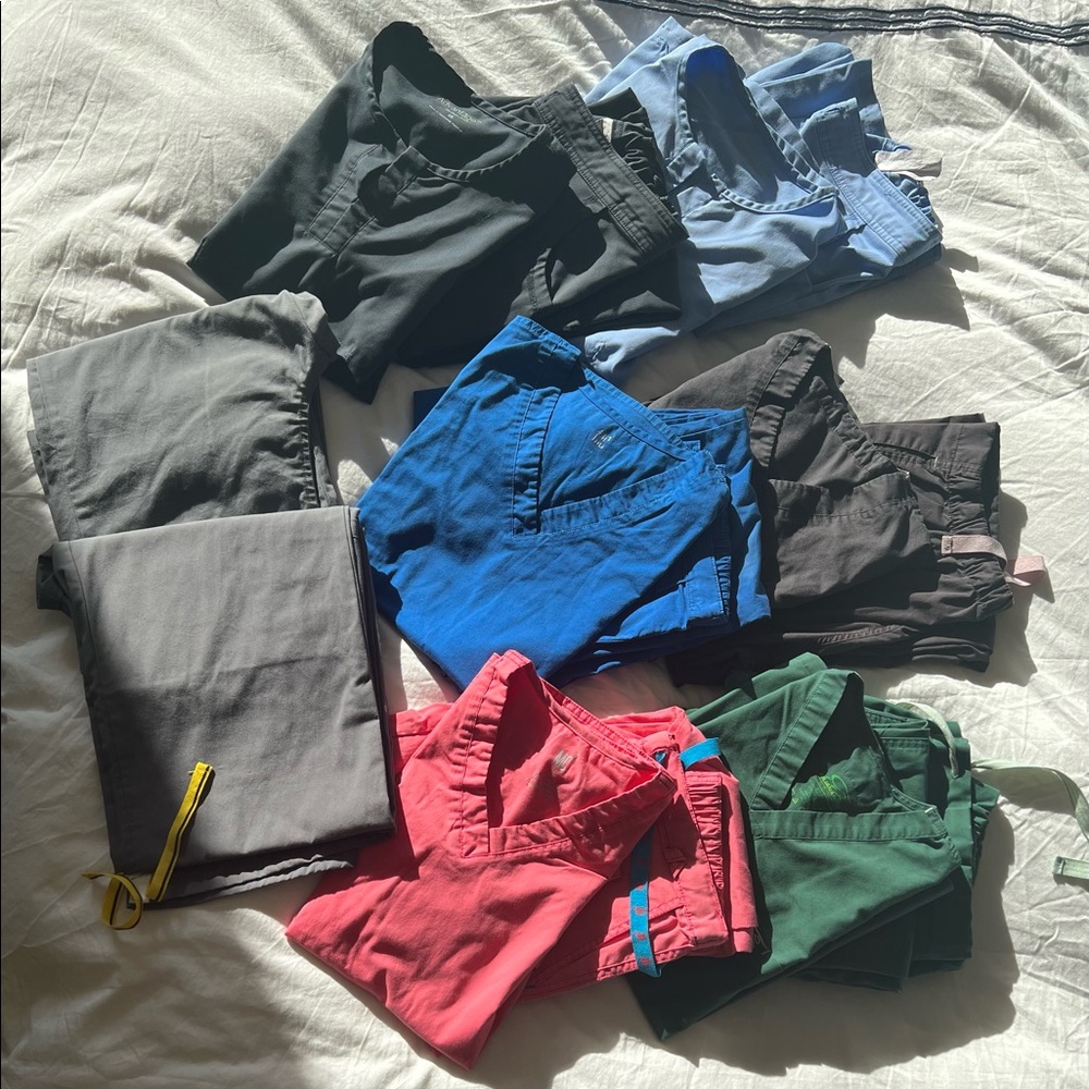Medical scrubs, in multiple colors XS size. Lightly worn.